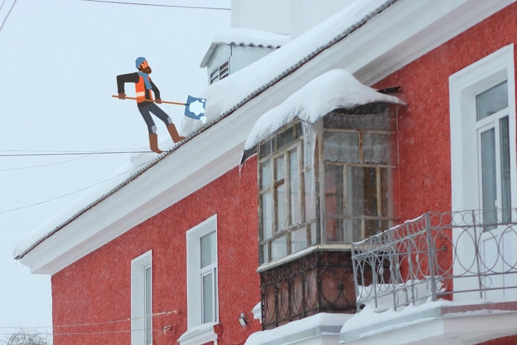 Человек чистит крышу