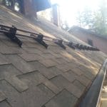 снегозадержатели и сетка в желобах